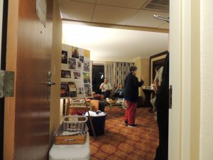 Heinlein Society party room entrance with Heinlein photo display