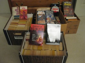 These are containers of books ready to go into shipping boxes. Yes, these are all Heinleins. These smaller boxes are carried to the area where we box for shipment.